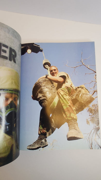 The War in Iraq: A Photo History (1st EDITION) - My Store